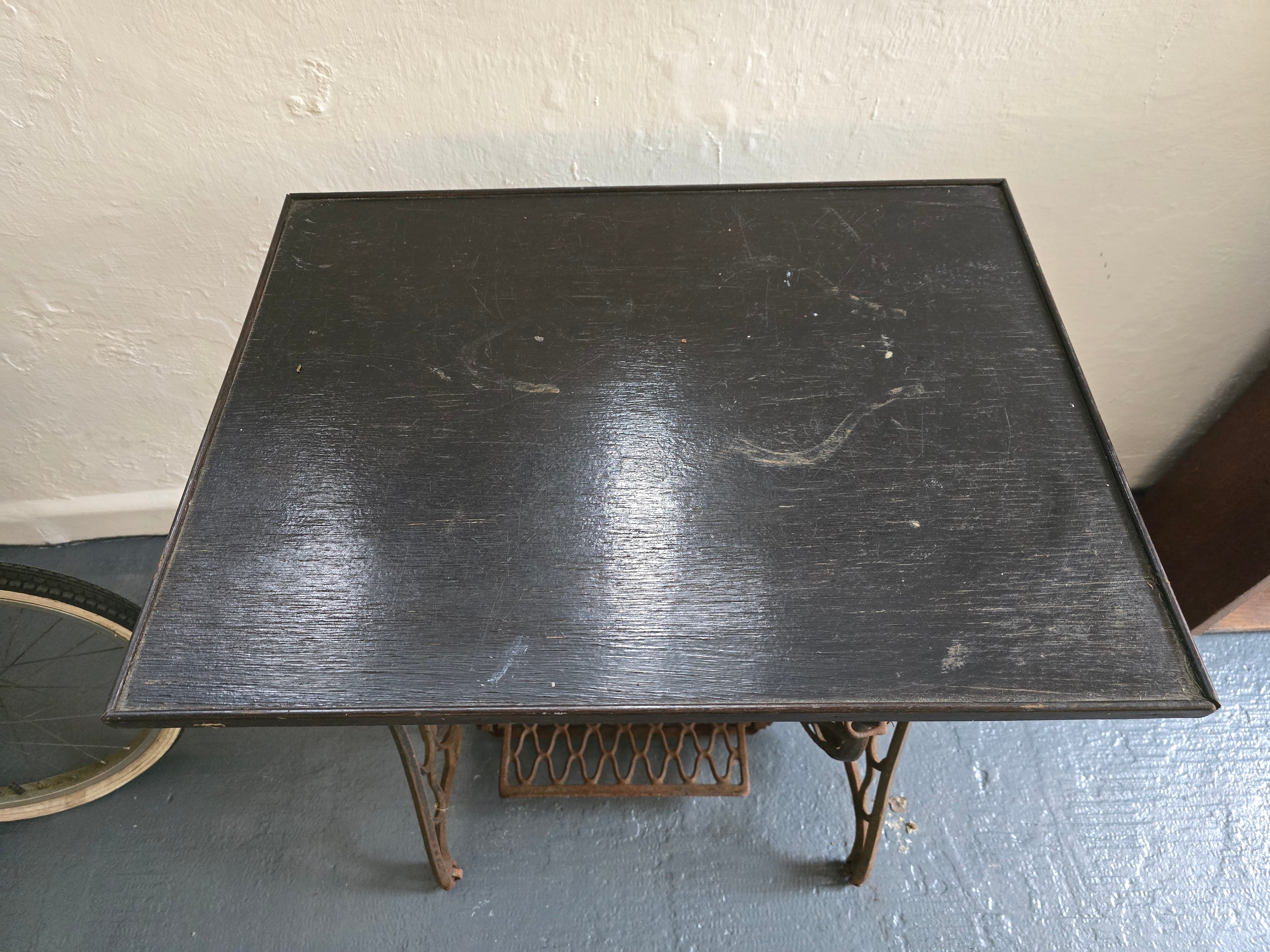 Singer sewing machine base. Table